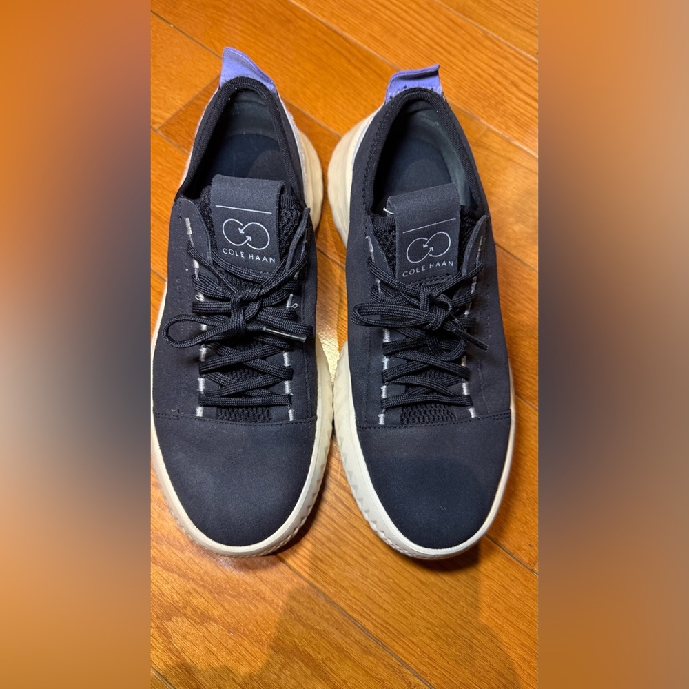 Cole Haan women’s Black and White Sneakers